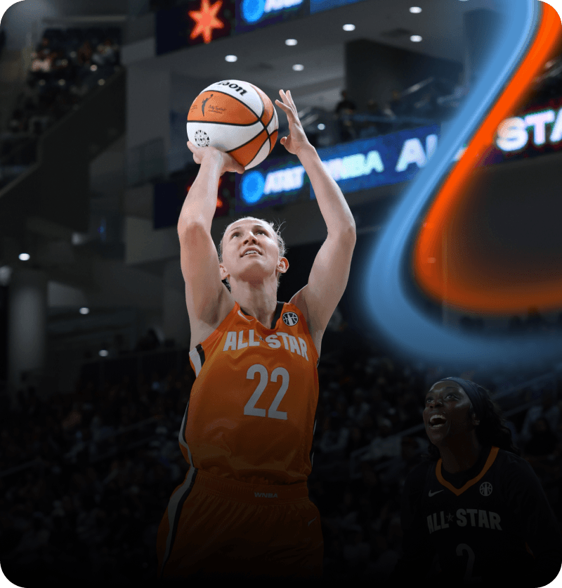 WNBA All-Star in an orange uniform elevates for a jump shot